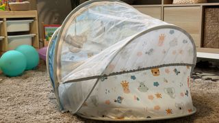 Cuna de viaje plegable con mosquitera