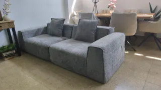 Sofá de tela gris nuevo