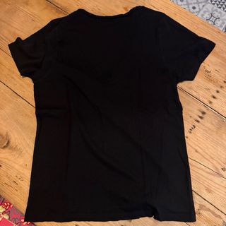 Camiseta Scalpers negra con detalle calavera