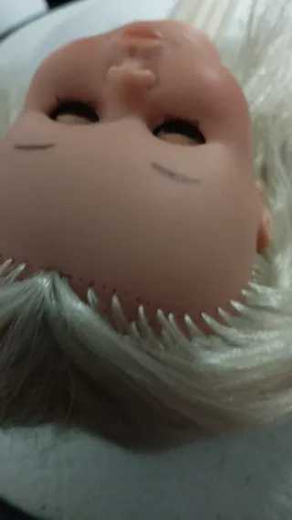 Nancy cabeza de muñeca rubia