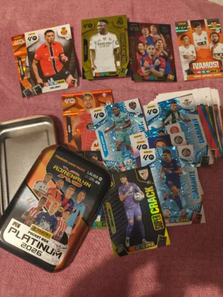 Lata y cromos Adrenalyn 25-26