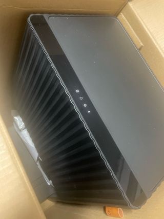 Robot aspirador Roomba con base