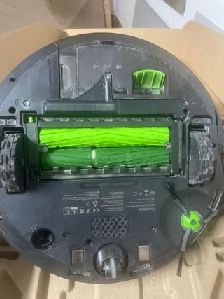 Robot aspirador Roomba con base