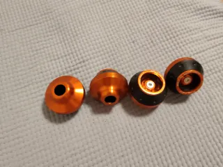 Tapones Naranjas Metalizados Bici/Patinete