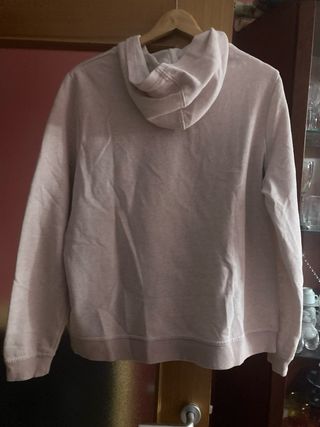 Sudadera rosa con capucha y bolsillo