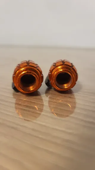 Tapones de válvulas granada naranja