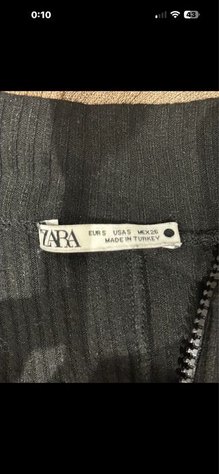 Mono Zara punto cremallera blanco y negro