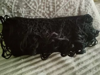 Cartera de mano artesanal negra