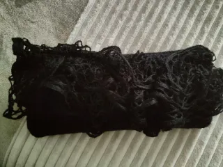 Cartera de mano artesanal negra