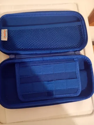 Nintendo Switch Lite Verde + estuche azul