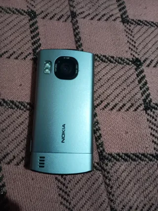 Nokia 6700 SLIDE Plata + Cargador Original