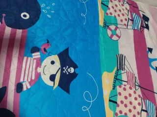 Colcha infantil reversible pirata y ballenas