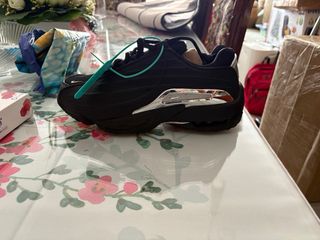 Nike Nocta Negro y Plateado