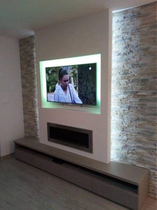 Muebles de salón con chimenea