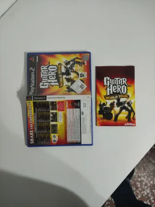 Atención sólo caja manua y portada Guitar Hero Wo