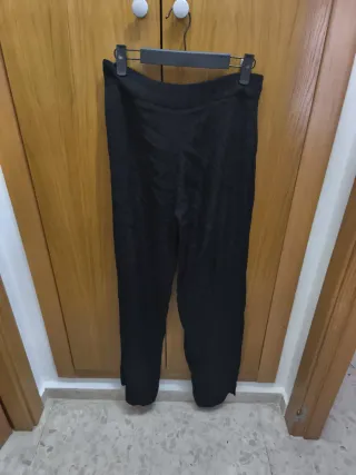 Pantalón vestir negro estampado discreto