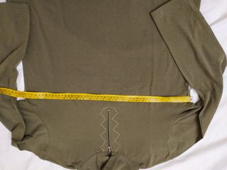 Maglia maniche lunghe con zip e decorazione
