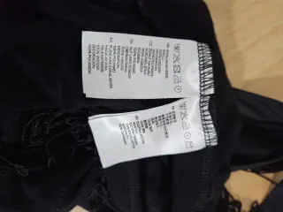 Vestido negro estilo Charleston con flecos H&M