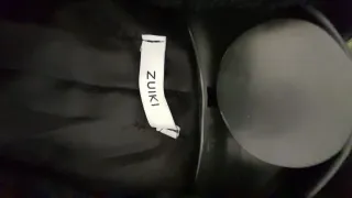 Cappotto nero con pelliccia sintetica