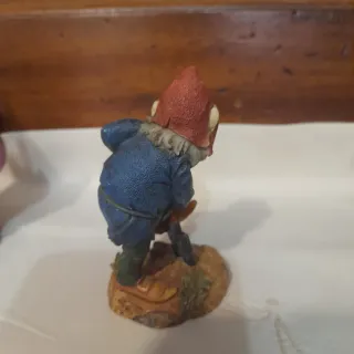 Tre gnomi decorativi in resina