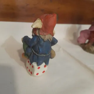 Tre gnomi decorativi in resina