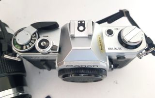 Canon AE-1 + Flash Sunpak GX14 + Lente 135mm