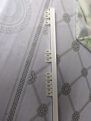 Riel para cortina de metal