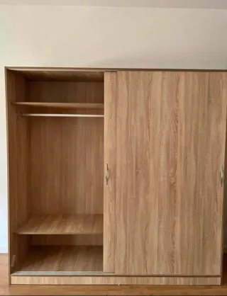 Armario puertas correderas blanco y madera