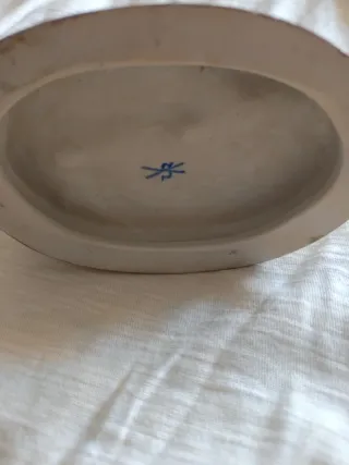 Figura de porcelana con baño de oro