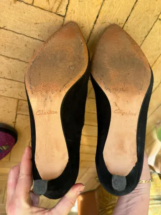 Botines ante Clarks negros