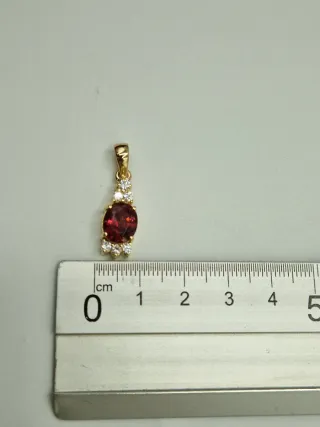 Colgante de oro 18kt con brillantes.