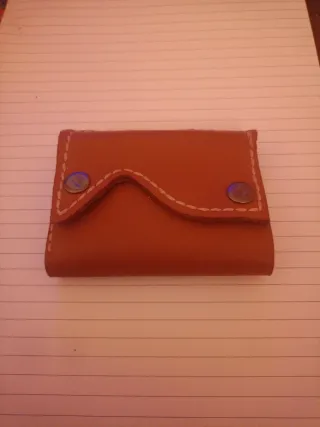 Cartera de cuero marrón