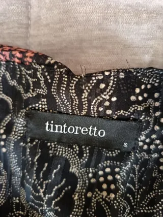 Falda estampada negra y marrón,con hilos plateados