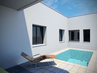 Casa adosada en venta en Tomelloso