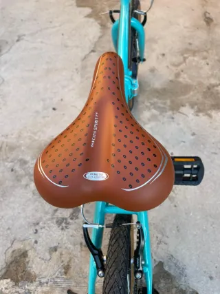 Bicicleta plegable color turquesa