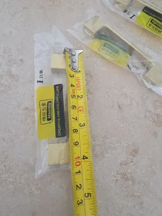 Tiradores metálicos dorados (5 unidades)