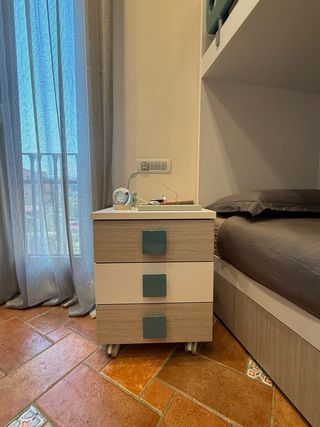 Cameretta con letto a castello e scaletta