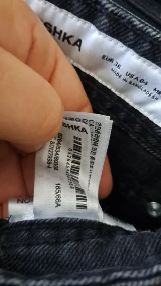 Vaqueros Bershka negros con tachuelas