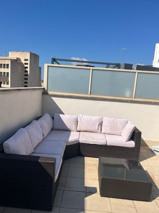 Sofá esquinero exterior y mesa centro
