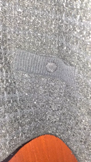 Jersey negro con hilitos plateados