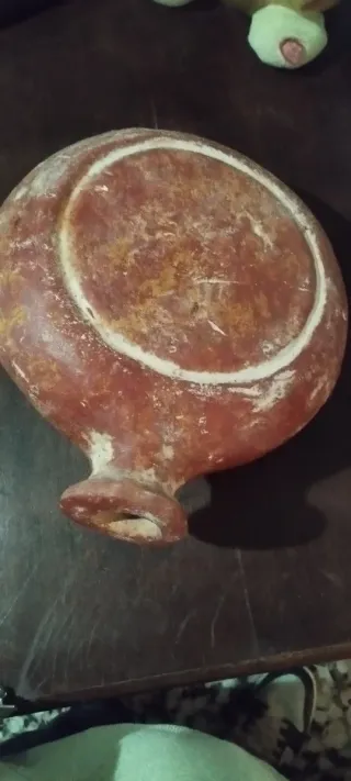 Borraccia antica in terracotta con sole