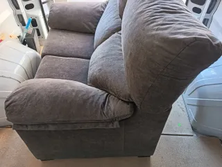 Sofá 2 plazas gris tela como nuevo,apenas se uso.