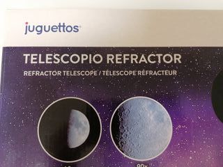 Telescopio refractor con trípode