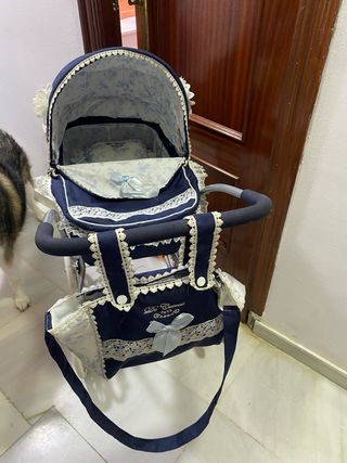 Carrito de muñecas azul con capota