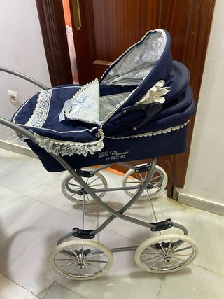 Carrito de muñecas azul con capota