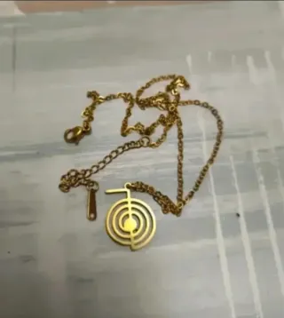 Colgante Chocurei Reiki dorado Inox sanación
