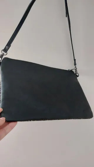 Bolso de mano negro con purpurina