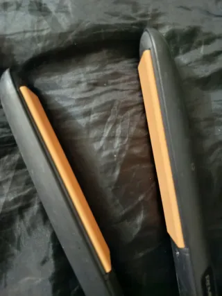 Plancha de pelo Remington gris y naranja
