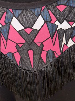 Jersey con estampado geométrico y flecos