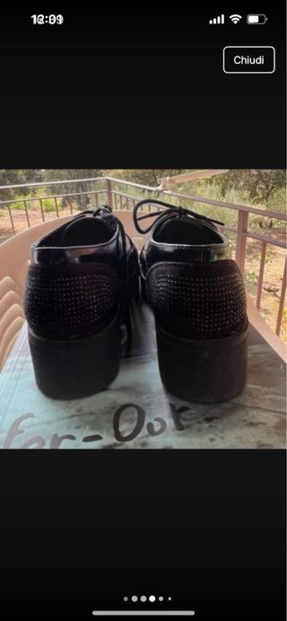 Scarpe donna modello derby nere